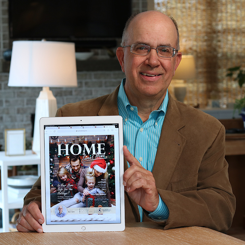 Jim Curry Showing a Digital Magazine